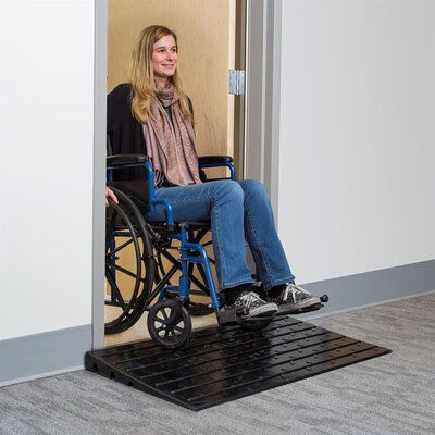 Easily overcome rises with the rubber doorway ramp. The ramp has an impressive can easily support most wheelchairs or power scooters. It is designed to be used both indoors and out. The solid rubber construction easily accommodates gravel and other uneven surfaces and is safe in all weather conditions due to the non-slip textured surface. For added convenience, this threshold ramp includes 3 bottom channels that are ideal for containing hoses, cables, wires, extension cords, and anything else cr Ramp Stairs, Portable Ramps, Power Scooter, Patient Lifts, Threshold Ramp, Door Thresholds, Wheelchair Women, Power Chair, Wheelchair Ramp