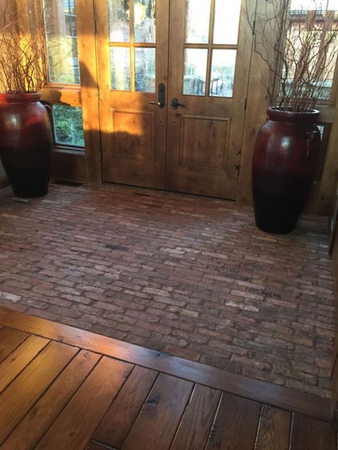 Brick To Hardwood Transition, Brick Flooring Transition To Wood, Old Brick Flooring, Rustic Brick Floor, Stone Brick Wood Interior, Polished Brick Floor, Brick Floor Transition To Wood Floor, Wood To Brick Floor Transition, Old Brick Floor