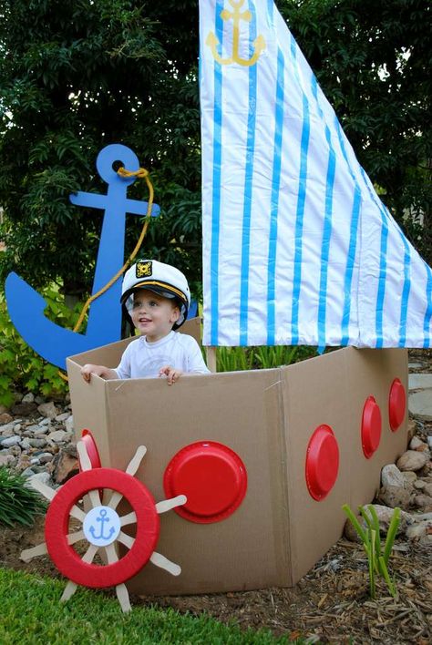 Nautical birthday party photo booth idea! Build a cardboard boat with paper plate windows, a sheet for a sail and a prop captain's hat. Memories for years! Sailor Birthday, Sailor Party, Cardboard Boat, Sailor Theme, Nautical Birthday Party, Nautical Themed Party, Nautical Birthday, Pirate Birthday Party, Nautical Party