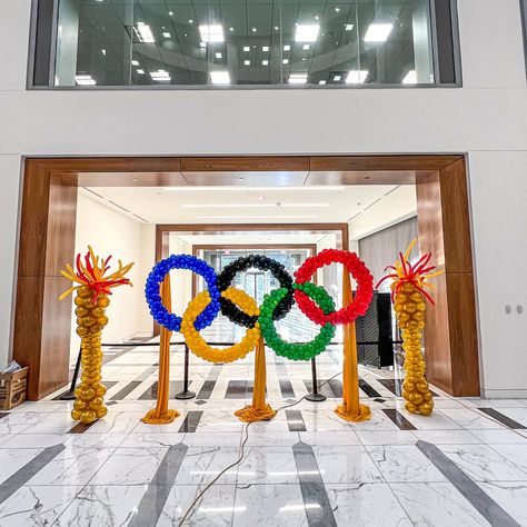 WE’RE GOING FOR GOLD! 🏅🎉 We’re beyond excited for the start of the Olympics and thrilled to have been a part of the action! 🎊 This morning, our team installed an incredible balloon display to celebrate the games and we couldn’t wait for you to see it! 🎈👀 . . #OlympicFever #TeamUSA #BalloonInstallation #OlympicDecor #GoingForGold #Paris2024 #OlympicGames #BalloonArt #EventDecor #SportsDecor” Balloon Bar, Olympic Theme, Olympic Torch, Balloon Display, Prom Theme, Balloon Installation, Going For Gold, Sports Decorations, Balloon Decor