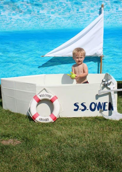 DIY sailboat photo prop for a nautical birthday party by Buzzworthy Parties Nautical First Birthday Party, Row Your Boat Birthday Party, Sailboat Party Theme, Boat Theme Birthday Party, Sailing First Birthday, Sailboat Birthday Party, Sailing Into One Birthday, Nautical Birthday Party Decorations, Sandbox Diy