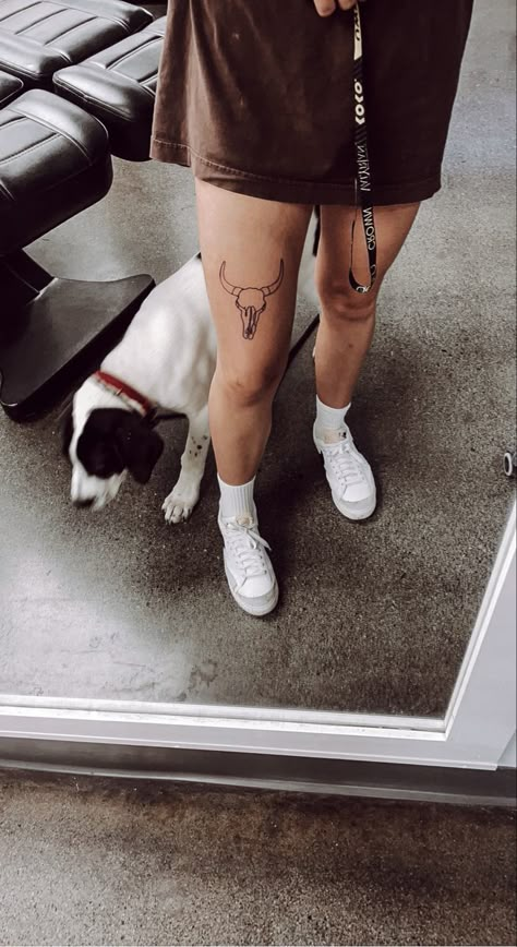 Western Above Knee Tattoo, Cow Leg Tattoo, Longhorn Tattoo Above Knee, Woman’s Western Tattoos, Cute Southern Tattoos For Women, Top Of Leg Tattoo, Country Western Sleeve Tattoo, Minimalist Western Tattoo Ideas, Cow Skull Knee Tattoo