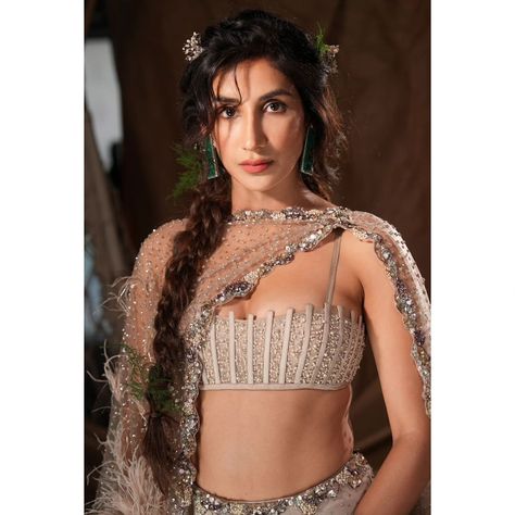 Stunning @gulati06 in "Myra" Tulle Lehenga Set for #ambaniwedding Dusty Copper crystallized tulle lehenga set. Paired with boned bustier choli and draped dupatta with feathered sleeve detail Available at Delhi and Mumbai stores #ambani #ambaniwedding #basra #indianbride #dollyjstudio #weddinggown #weddinginspo #dollyjbride #dollyjlehenga #dollyjgown #couture #bridalgown #wedmegood #lehenga #dollyj #summercollection #bridalgowns #springsummerfashion #couturefashion #spring #summer Feather Lehenga, Tulle Lehenga, Sleeve Detail, Indian Bride, Western Wear, Couture Fashion, Spring Summer Fashion, Wedding Inspo, Summer Collection