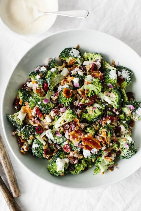 This easy, healthy broccoli salad is a combination of broccoli, bacon, red onion, cranberries, sunflower seeds and goat cheese! Best Broccoli Salad Recipe, Healthy Broccoli Salad, Broccoli Bacon, Raw Broccoli, Paleo Salads, Broccoli Salad Recipe, Homemade Mayonnaise, Dairy Free Cheese, Best Salad Recipes