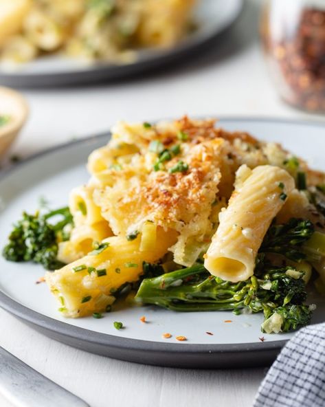 This one-pot meal is comfort food at its finest. It’s a vegetarian pasta packed with leeks and broccolini, which might make it sound more like a health-focused meal than a cozy casserole (though who says supper can’t be both?). But with heavy cream, melty cheese and bread crumbs, this dish is as cozy as they […] Fall Comfort Food Recipes, Broccolini Pasta, Cheese And Bread, Comfort Meals, Food Manufacturing, Fall Comfort Food, Baked Strawberries, Comfort Food Recipes, Bean Burger