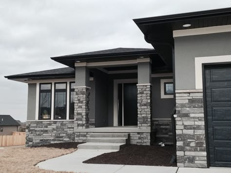 Black And Grey Houses Exterior, Modern Gray House Exterior, Dark Grey Stucco House Exterior, House Gray Exterior, Dark Stucco Exterior House, Stucco Exterior Colors Modern, Gray House With Black Trim, Grey Stucco House Exterior, Dark Grey House Exterior