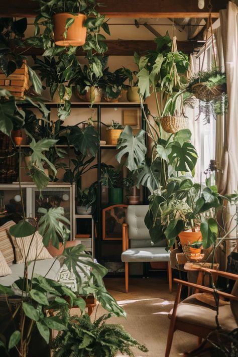 Dive into this urban jungle apartment where lush greenery and cozy furniture create a warm, inviting atmosphere. Get tips on incorporating indoor plants to enhance your home’s natural light and aesthetic. Room Of Plants, Plant Collection Aesthetic, Cozy Green Aesthetic, Plants Indoor Aesthetic, Green Plant Room, Plant Apartment Aesthetic, Plant Aesthetic House, Home Plants Aesthetic, House Plant Aesthetic