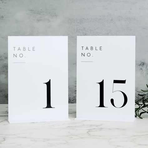 PRICES MAY VARY. PACKAGE INCLUDES: 5x7 inch white acrylic table numbers 1-15 with white acrylic base, total 15 sets in one pack. Each acrylic sign Has A Protective Film On Both Sides To Prevent Scratches and when you are ready to use it, you should peel it off. MINIMALISTIC STYLE DESIGN: These modern minimalistic acrylic table number sign are the perfect touch to add to your wedding. We love the sleek, clean lines of these arch acrylic signs, they are a beautiful wedding table centerpieces decor Table Numbers For Wedding, Table Number Signs, Acrylic Table Numbers, Wedding Reception Party, Elegant Theme, Acrylic Table Number, Table Centerpiece Decorations, Number Signs, Signing Table Wedding