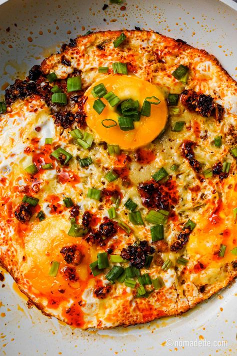 Eggs And Olives, Chili Eggs Breakfast, Chili Crunch Eggs, Recipes With Chilli Oil, Chili Crisp Eggs, Chilli Oil Eggs, Chili Oil Eggs, Chilli Eggs, Egg Chilli Recipe