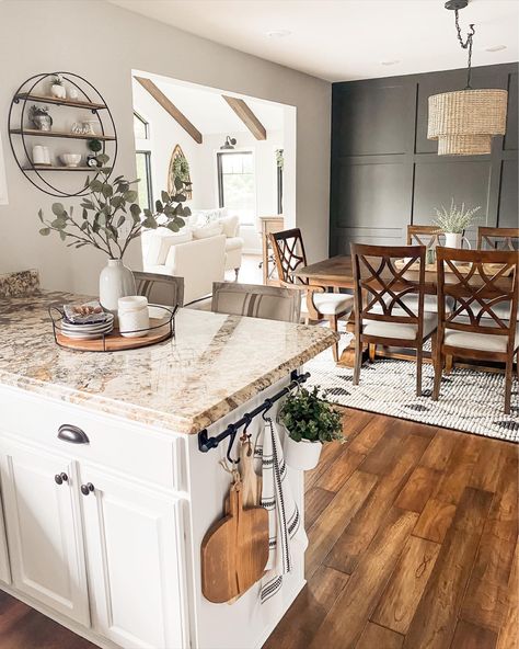 Open Concept Two Paint Colors, Dining Room With Green Accent Wall, Open Concept Board And Batten, Green Accent Wall In Kitchen, Country Boho Dining Room, Open Concept Dark Walls, Accent Wall Kitchen Dining Room, Open Dining Room Wall Decor, Kitchen Table Dark Floors