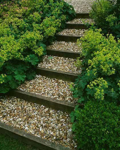 Landscape Pathway Ideas: 9 Stunning Options ~ Bless My Weeds Stone Steps In Grass Slope, Outdoor Stairs On Hill, Easy Garden Steps On A Slope, Sloping Pathway Ideas, Terraced Steps Landscaping, Sloped Garden Path, Natural Steps On Slope, Hillside Stairs Landscaping, Railroad Tie Steps On Slope