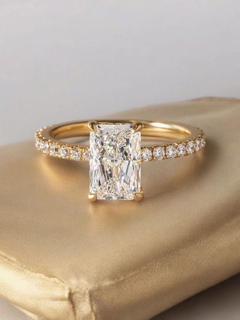 Make your proposal unforgettable with our stunning Radiant Cut Moissanite Wedding Ring, crafted in luxurious 18K solid yellow gold. Featuring a hidden halo design, this engagement ring for women sparkles with timeless elegance and brilliance. Perfect for the best wedding proposal, this ring combines classic beauty with modern sophistication, ensuring a cherished symbol of your love for years to come. ✥𝐌𝐚𝐢𝐧 𝐒𝐭𝐨𝐧𝐞 𝐃𝐞𝐭𝐚𝐢𝐥𝐬 → Shape: Radiant Cut Moissanite → Weight: 2.00 Ct  → Color: Mosinite Engagement Rings, Gold Emerald Cut Ring Engagement, Emrald Cut Wedding Ring, Engagement Ring Box Aesthetic, Emerald Cut Engagement Ring Radiant, Gold Engagement Rings Rectangle, Rectangle Gold Wedding Ring, Big Wedding Rings Gold, Gold Ring Design For Women Engagement