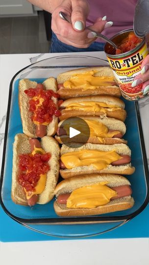 588K views · 9.7K reactions | this easy dinner is perfect for summer! | this easy dinner is perfect for summer!

quick & easy cheesy rotel dogs can be made in the oven or on the grill! | By Kristin's Friends | Alright y'all. I have some hot
dog buns in my greased bacon dish and they all open.
Alright? Very important. So next here we're going to take
some Nathan's hot dogs. We're going to put one in each bun.
Alright? So y'all I I know there's eight hot dogs in the
package. And there's eight buns in the package but I couldn't
find a dish to hold eight comfortably. So we doing seven.
And we just going to one's going to be left out. I mean I
guess I could squeeze one more in here but I don't know y'all.
I feel like seven's good this pan. Um I did spray the bottom
with some olive oil. Alright. Bacon Dishes, 3 Ingredient Recipes, Easy Cheesy, Hot Dog Recipes, Quick Easy, Family Dinner, Hot Dog Buns, Easy Dinner, Mexican Food Recipes