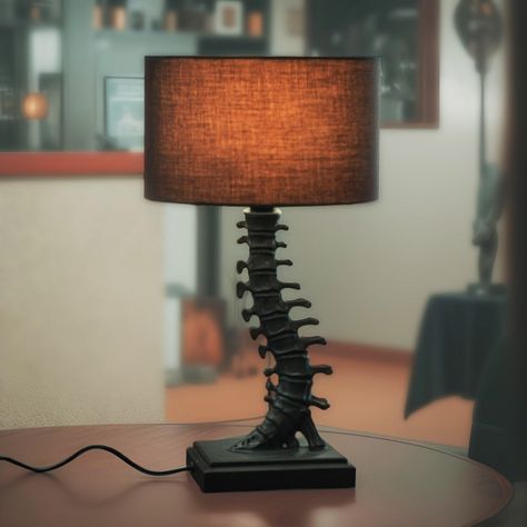 Which gothic table lamp is your favorite? 🌙💀 1. Full Skeleton Lamp - Make a bold statement with this unique piece that combines eerie elegance and striking design. 2. Tall Vertebrae Spine Lamp - Elevate your space with this towering, intricately detailed lamp perfect for adding a dramatic touch. 3. Compact Vertebrae Spine Lamp - Perfect for desks or small tables, this lamp offers a blend of gothic charm and functionality. All three lamps are now available at GothicPlus.com! Enhance your hom... Skeleton Lamp, Victorian Gothic Lamp, Gothic Lamp, Gothic Table, Skeleton Lamp Shade Vintage, Gothic Desk Lamp, Black Skull Lamp, Goth Table Lamp, Salt Lamps