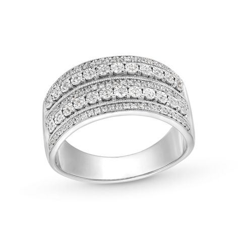 Celebrate the love that has only grown stronger with this vintage-inspired diamond anniversary band.Sterling silverTwo rows of diamonds - each artfully set to enhance size and sparkle - alternate with three diamond-lined ribbonsIntricate milgrain borders add heirloom appeal0.25 ct. t.w. of diamonds Diamond Anniversary Bands, Peoples Jewellers, Diamond Anniversary, Anniversary Bands, Borders, Vintage Inspired, Diamonds, Sparkle, Sterling Silver