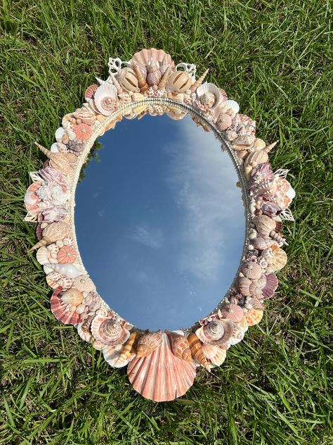 Materials used are wood frame, mirror, seashells Shell Mirrors Ideas, Long Mirror Decorating Ideas, Mermaid Furniture, Unique House Decor, Mirror Art Diy, Cool Mirror, Seashell Picture Frames, Creative Mirror, Seashell Frame