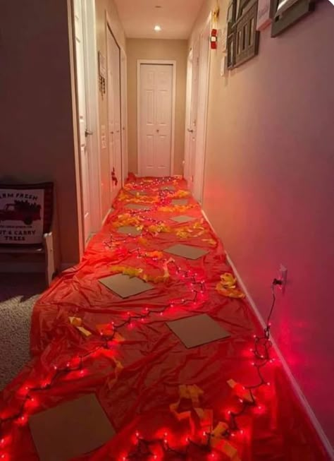 Homemaking Tips | A little $2 tissue paper,  and some Christmas lights really bring the floor is lava to life 🌋👏🏼 | Facebook Elf Ideas Easy, Floor Is Lava, The Floor Is Lava, Awesome Elf On The Shelf Ideas, Elf Activities, Xmas Elf, Elf Antics, Elf Fun, Elf Ideas