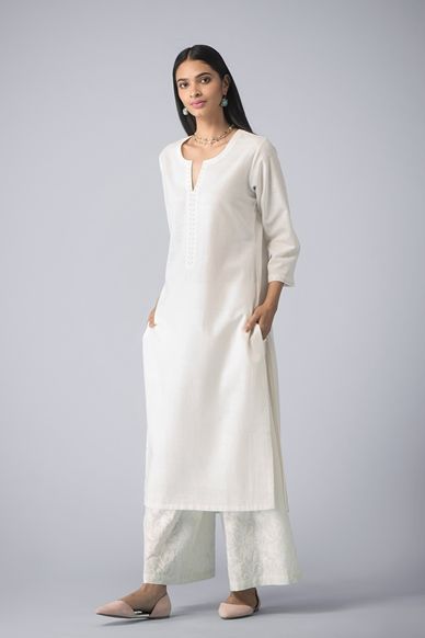 Good Earth - Noor Naira:Jaal Cotton Farshi Plain White Kurti Designs Cotton, White Kurti Designs, Travel Dresses For Women, White Kurti, Travel Dresses, Nykaa Fashion, Yoke Design, Long Kurta, Formal Wear Women