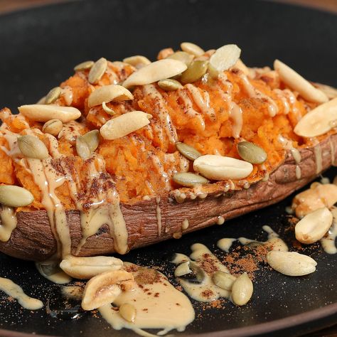 How often do you find a recipe that’s easy, delicious, and nutritious, all rolled into one? Meet the Loaded Sweet Potato With Peanut Butter—a dish that ticks all these boxes and then some. It takes a mere 5 minutes to prepare and just 10 minutes to cook, making it a prime choice for anyone looking for a quick yet filling meal. Sweet Potato And Peanut Butter, Loaded Sweet Potatoes, Sweet Pumpkin Seeds, Sweet Potato Recipes Baked, Loaded Sweet Potato, Baked Sweet Potato, Creamy Mashed Potatoes, Sweet Potato Recipes, Filling Recipes