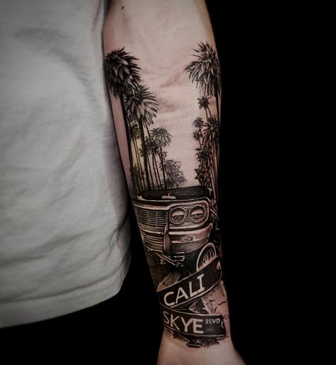 Tattoo done by Jason Vickers ig-@jason_vickers_tattoo Forearm tattoo, car, palm trees, california, low rider, impala, street sign, road sign #tattoo #tatted #ink #cai Hollywood Sleeve Tattoo, California Palm Trees Tattoo, California Tattoo Ideas Men, California Theme Tattoo, Road Sign Tattoo Ideas, California Sleeve Tattoo Ideas, Socal Tattoo Ideas, Realistic Car Tattoo, California Leg Sleeve Tattoo