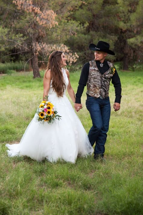 Our perfect country wedding!  Camo. sunflowers. rustic. country. Camo Wedding Theme, Groom Attire Jeans And Boots, Camo Wedding Groomsmen, Camo Groomsmen Attire, Camo Wedding Ideas For Men, Camo Suit Wedding, Country Style Wedding Ideas, Country Wedding Groomsmen Attire, White Camo Wedding Ideas