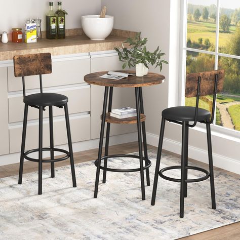 PRICES MAY VARY. ✅【Simplistic Set for Any Occasion】A round bar height table and 2 bar stools with high-end wood grains - a great combination of industrial look and modern appeal. It will be a wonderful spot where you enjoy breakfast with family or as cafe table, bar table, dining table, pub table for living room, dining room, kitchen, bistro, indoor or outdoor, there is nothing better. ✅【Space Saving】Featuring a round shape, this 3 piece kitchen table set will perfectly fit into any narrow space Round Bar Stools, Bar Table Set, Round Bar Table, Bar Table And Stools, Table Bistrot, Bar Table Sets, Upholstered Stool, Counter Height Dining Table, Kitchen Table Settings