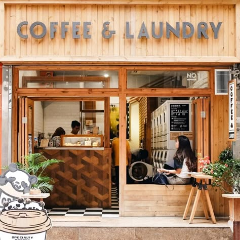 Weird Laundromats Around the World Laundry And Coffee Shop, Cafe Laundromat, Coffee Laundry Shop, Laundry Coffee Shop, Laundromat Business Names, Laundry Interior, Laundrette Design, Laundry Mat Interior Design, Self Service Laundry Shop Design