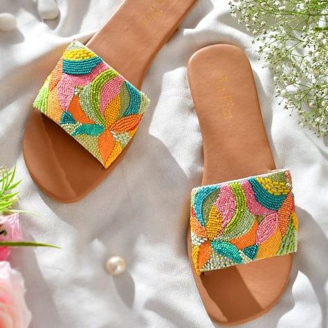 🌈✨ Step into summer with our vibrant, handmade multicolour embroidered sliders! Each pair is a unique piece of art, crafted with love and attention to detail. Perfect for adding a pop of color to any outfit! 💖👡 Handmade with care 🎨 Beautiful multicolour embroidery 💫 Unique and one-of-a-kindTreat your feet to comfort and style. Available now in limited quantities!#Handmade #Embroidered #Sliders #SummerStyle #UniqueFashion #ColorfulShoes #ShopSmall #supportartisans Embroidery Unique, Indian Wedding Gifts, Fancy Sandals, Slider Design, Embroidered Flats, Beaded Sandals, Colorful Shoes, Womens Wedding Shoes, Bride Gift