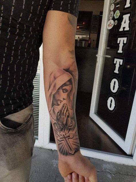 Angel With Rosary Tattoo, Mother Mary Tattoos For Men, Virgin Mary Tattoo Forearm Men, Virgin Mary Tattoo For Women Sleeve, Virgin Mary Tattoo Shoulder, Virgin Mary Rosary Tattoo, Virgen De Guadalupe Tattoo Ideas Forearm, Virgin Mary Praying Tattoo, St Mary Tattoo