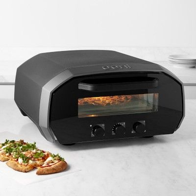 Ooni Volt Indoor & Outdoor Pizza Oven #williamssonoma Clean Pizza Stone, Indoor Pizza Oven, Electric Pizza Oven, Mini Appliances, Portable Pizza Oven, Homemade Pizzas, Electronic Store, Pizza Wheel, Cute Bakery