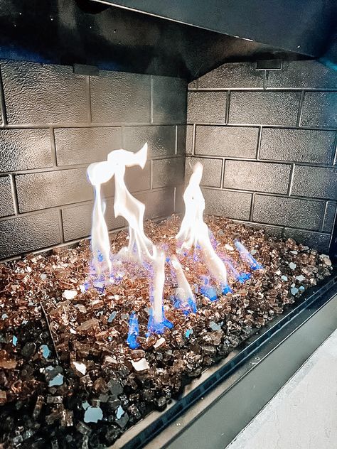 Gas log fireplace converted with fire glass DIY Gas Fireplace Replacement Logs, Fireplace With Glass Rocks, Gas Fireplace Glass Rocks, Gas Fireplace Rocks Inside, Paint Melamine Cabinets, Old Fireplace Ideas, Indoor Fireplace Ideas, Water Fireplace, Fireplace Filler