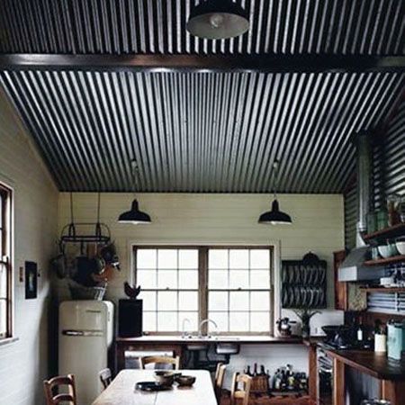 photo- http://www.atticmag.com/2013/10/industrial-chic-corrugated-tin/ Black Corrugated Metal Ceiling, Corrugated Metal Skirting, Corigated Metal Ceiling, Industrial Ceiling Ideas, Skoolie Ceiling, Galvanized Tin Ceiling, Barn Tin Ceiling, Corrugated Metal Ceiling, Tin Ceiling Kitchen