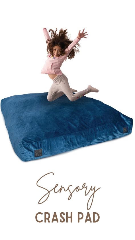 The crash pad can be used as a soft landing zone for kids who crave sensory input, or as a giant bean bag for reading and relaxing, providing safe sensory stimulation. The outer velour cover is removable and washable for easy care. The inner cover wipes clean and comes with a zipper lock so that the foam won’t pop out during use. #sensory #sensoryprocessing #crashpad #SPD #ad Foam Blocks For Kids, Giant Bean Bag, Landing Zone, Blocks For Kids, Large Yoga Mat, Infant Sensory Activities, Sensory Wall, Sensory Input, Sensory Bag