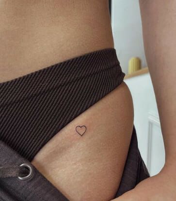 Heart Hot Bikini Line Tattoo Pelvic Tattoos Women Ideas, Small Hip Tattoos Women, Line Tattoo Designs, Pelvic Tattoos, Small Thigh Tattoos, Upper Leg Tattoos, Upper Thigh Tattoos, Private Tattoos, Tiny Heart Tattoos