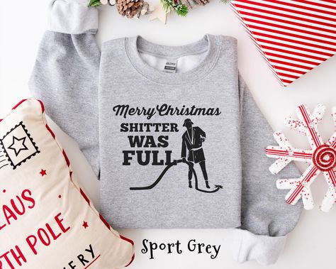 Shitters Full Shirt Funny Christmas Vacation Sweater for Men Women Gift Cousin Eddie Christmas Vacation Funny Holiday Tee Sweatshirt Hoodie HOW TO ORDER ➀ Select color ➁ Select the size (Please check size chart) ✦ True to size. Size up 1-2 sizes for an oversized look. ➂ Add to cart ✦ (Optional) "Add message to Seller" on the checkout page. GARMENT FEATURES ✦ Crew neckline ✦ Direct to garment printing - no vinyl, decal, or iron-on technique ✦ Our designs are printed on the garment to last a long Eddie Christmas Vacation, Christmas Vacation Sweater, Cousin Eddie Christmas Vacation, Christmas Vacation Sweaters, Shitters Full, Vacation Funny, Cousin Eddie, Vacation Humor, Funny Holiday