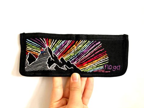 #climbing #mountains #rainbow #embroidery #colorful #wallet #aesthetic #giftideas #handmade Wallet Aesthetic, Embroidered Wallet, Climbing Mountains, Rainbow Embroidery, Climbing, Clothing Brand, Rainbow, Wallet, Embroidery