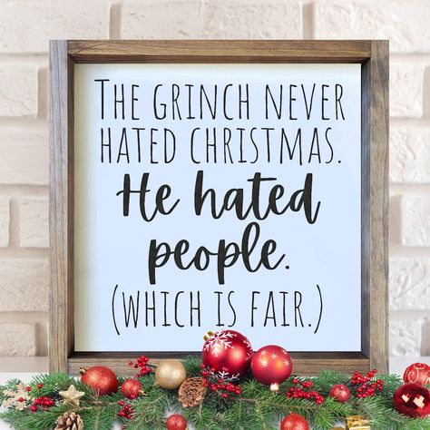 Design: The Grinch Never Hated Christmas. He Hated People (Which is Fair) This 13.5" x 13.5" hand-painted sign comes with a shadowbox-style frame and can stand alone on a shelf. It also comes ready to hang on a wall with a sawtooth hanger. All wood signs ship via USPS with free shipping. Please make sure your address is correct. NOTE: Each wood sign is hand-painted. No vinyl is used. Each sign is unique, takes 3-5 business days to create, and will vary slightly in appearance depending on wood gr Grinch Christmas Wood Signs, The Grinch Signs, Farmhouse Christmas Signs Diy, Cricut Christmas Signs Wood, Christmas Diy Signs Wood, Holiday Sayings For Signs, Xmas Signs On Wood, Grinch Wood Crafts, Diy Wood Christmas Decor