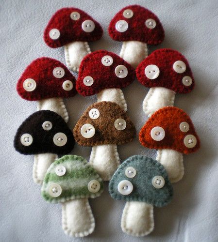 toadstool brooches | 10 little wool toadstool brooches made … | Flickr Felt Mushroom, Baby Mobil, Mushroom Crafts, Cute Sewing Projects, Sewing Stuffed Animals, Felt Embroidery, Felt Brooch, Felt Decorations, Button Crafts