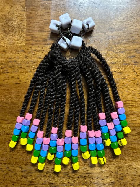 8 inch dark brown twists on an adjustable ponytail with rainbow square beads and white hair knockers. Brown Twists, Blue And Pink Bedroom, Childrens Hairstyles, Kids Hairstyle, Christmas Angel Crafts, Ponytail Tutorial, Braid Accessories, Kids Wigs, Beading For Kids