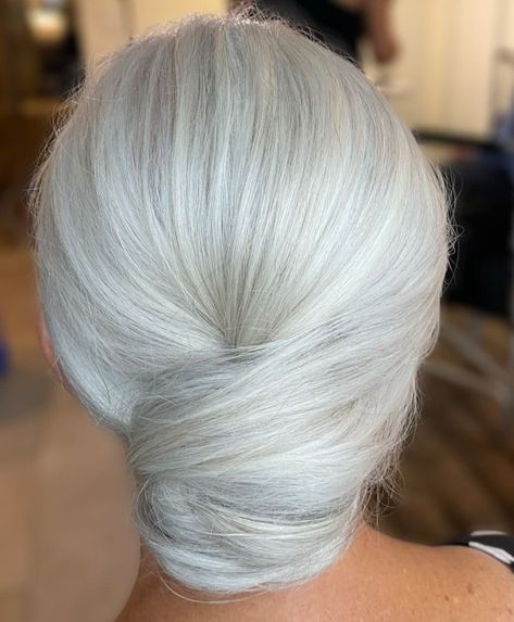 White Silver Chignon for Mother of the Bride Silver Hair Updo Wedding, Updos For Grey Hair Over 50, Grey Hair Updo Wedding, Gray Hair Updo Simple, Gray Hair Updos Over 50, Silver Hair Updo, Grey Hair Updos, Middle Bun, Loose Twists