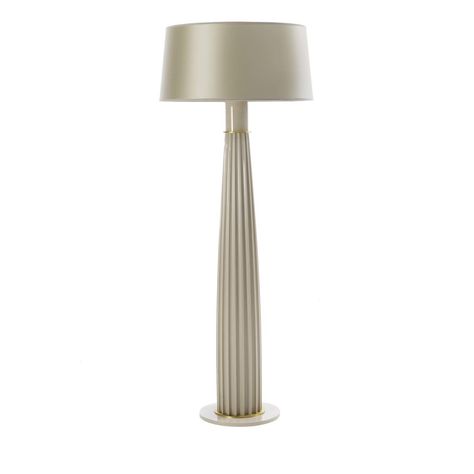 Part of the Orlando collection, featuring a sculptural silhouette and old-glamour allure, this floor lamp is a stunning addition to a classic or eclectic interior, where it will provide an extra source of light and a striking decorative accent. Its structure is made entirely of wood with a lacquered round base that supports a column crafted of solid wood with distinctive vertical grooves evoking classical elegance. The white silk shade tops this piece that is adorned with inserts in satin-finish Classic Floor Lamp, Cream Floor, Quartz Flooring, Italian Floor Lamp, Small Sideboard, White Floor, Wood Floor Lamp, Large Sideboard, Industrial Interiors