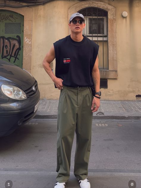 Loose Casual Outfits Men, Exploring Outfit Summer, Olive Green Cargo Outfit Men, Mens Streetwear Japan, Tank Top Men Fashion Street Styles, Urban Outfit Men, Men Streetwear Outfits Urban Fashion, Olive Pants Outfit Men, Sleeveless Top Outfit Men