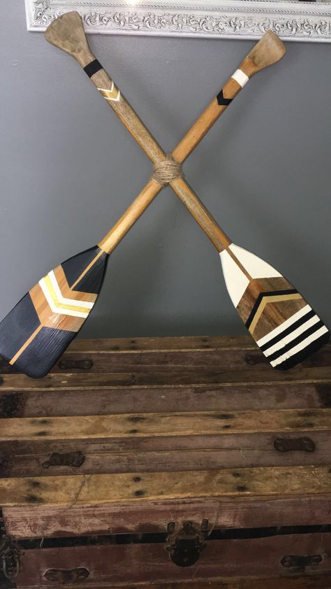 Oar decor. #paint #diy Painted Oar Designs, Old Oars On Wall Decor Ideas, Oar Painting Ideas, Wood Paddle Decor Ideas, Painted Oars Paddles Diy, Painted Oars Paddles Wall Art, Oar Decorating Ideas, Painted Canoe Paddles, Paddle Decor Ideas