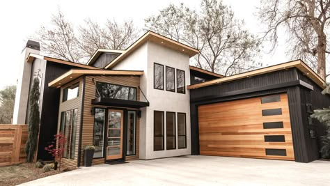 Contemporary Black Windows, Northpoint Cabinets, Split Level House Exterior Modern, Modern Home Exteriors, Boise Boys, Industrial House Exterior, Modern Home Exterior, Industrial Exterior, Modern Garage Doors