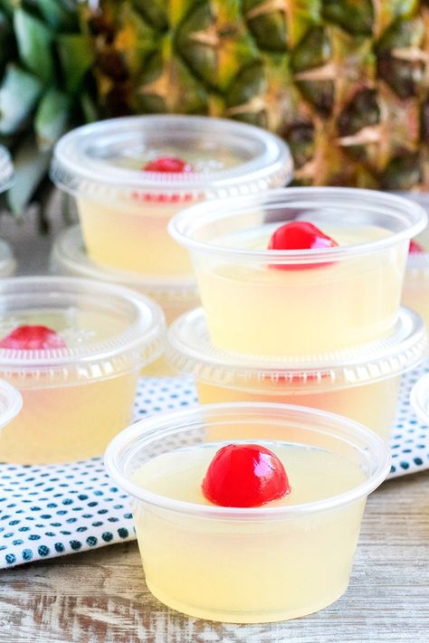 Pina Colada Jello Shots turn a summer cocktail staple into fun shots perfect for any party! Rum, pineapple & coconut are a tropical combination that'll be a hit with all your friends! Birthday Cake Vodka, Alcoholic Food, Vodka Jello Shots, Pina Colada Jello Shots, Best Jello Shots, Jello Shots Vodka, Jello Pudding Shots, Cake Vodka, Tropic Thunder