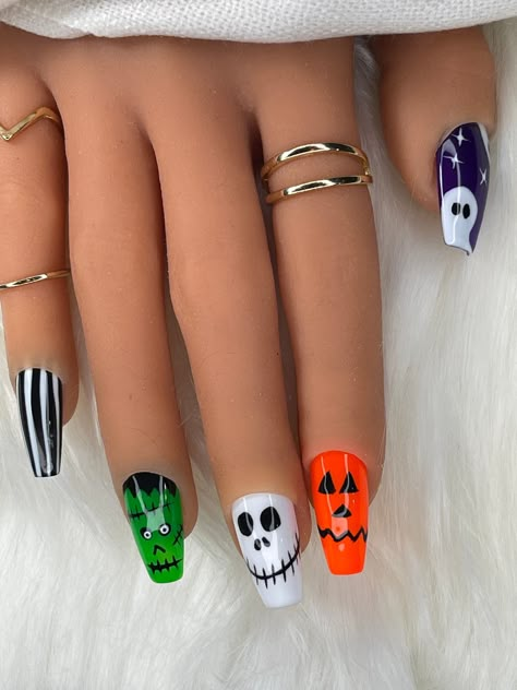 Halloween-inspired hand-painted nail designs feature ghosts, frankenstein, and skulls. Each regular set contains 10 press-on nails. **Check for your correct nail size as we are not responsible if the wrong size is ordered*** See chart on homepage for size guide. Alternatively, if you are unsure about your sizing, you can order a full set of 20 nails - 2 of each size or you can order a nail sizing kit. FAQ: How long do the nails stay on? It depends on how well you prep your natural nails before a Frankenstein Nails, Message Text, Halloween Acrylic Nails, Cute Halloween Nails, Painted Designs, Halloween Nail Designs, Halloween Nail, Halloween Nail Art, Nail Sizes