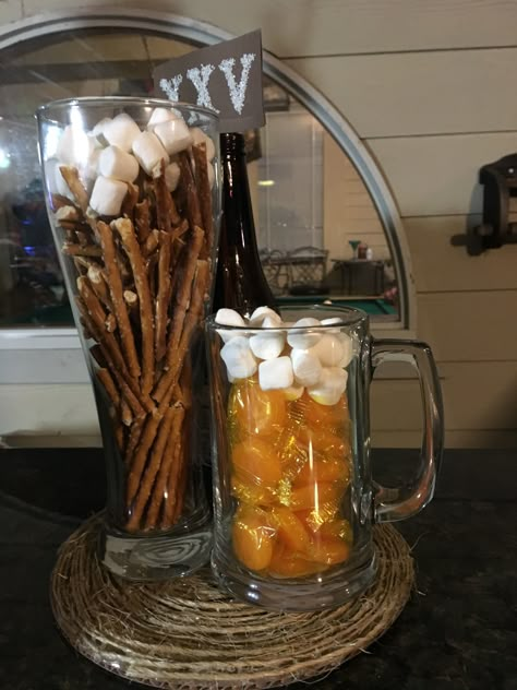 Bucket Of Beer Aesthetic, Beer Glass Centerpiece, Beer Party Table Decorations, Cheers And Beers Centerpiece Ideas, Beer Party Decorations For Men, 80th Birthday Party Centerpieces For Men, Beer Can Centerpieces, Beer Table Decorations, Beer Stein Centerpiece