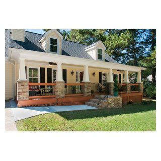 Full front porch addition on cape cod home near Atlanta, GA. Designed and built by Georgia Front Porch. Breezeway Doors, Exterior Remodel Before And After, Stone Porch, Front Porch Stone, Cape Cod House Exterior, Craftsman Porch, Cape Cod Home, Traditional Porch, Exterior House Remodel