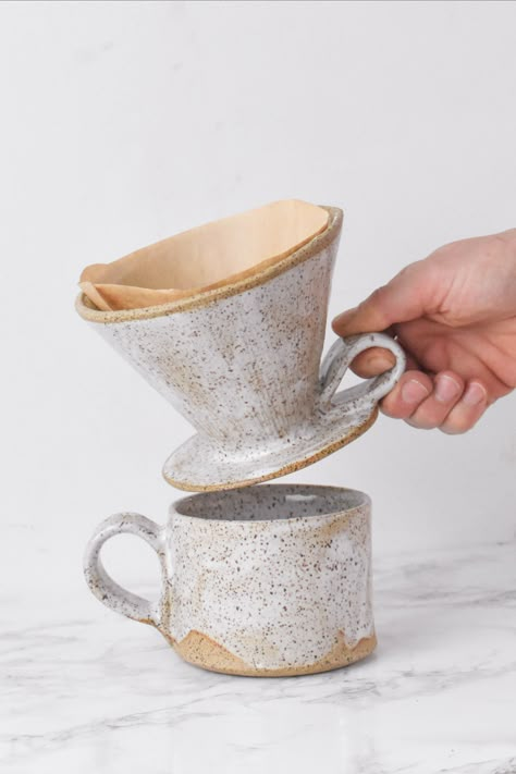 Introducing Wild Bower Studio's newest additions to our collection - the handbuilt Ceramic Pour Over and Breakfast Mug, crafted from high-quality stoneware clay in our green energy run studio in upstate NY. Our team of skilled artisans have put their heart and soul into creating these beautiful pieces, perfect for starting your day off on the right foot. The pour over allows for a smooth and delicious cup of coffee every time, while the breakfast mug Breakfast Mug, Ceramic Cafe, Foot Ring, Coffee Dripper, Diy Ceramic, Hand Built Pottery, Pottery Classes, Pour Over Coffee, Ceramics Projects