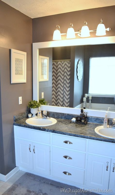 How to frame out that builder basic bathroom mirror (for $20 or less!) Basic Bathroom, Bathroom Mirror Makeover, Bathroom Mirrors Diy, Bathroom Mirror Frame, Mirror Makeover, Mirror Frame Diy, Ideas Hogar, Bathroom Redo, Trendy Bathroom